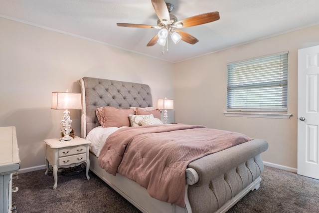 bedroom featuring carpet floors, ornamental molding, baseboards, and a ceiling fan