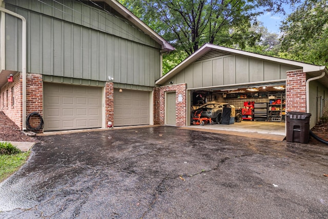 garage featuring driveway