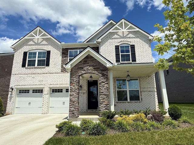 122 Blake Ln, Mount Juliet, TN 37122 - view of front of home featuring brick siding, driveway, and an attached garage