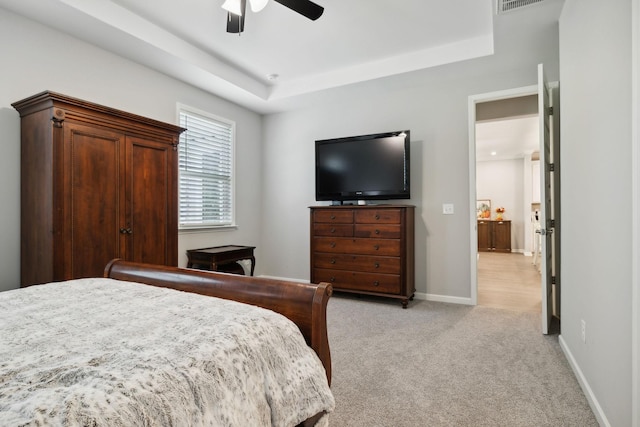 122 Blake Ln, Mount Juliet, TN 37122 - bedroom featuring light colored carpet, ceiling fan, baseboards, and a raised ceiling