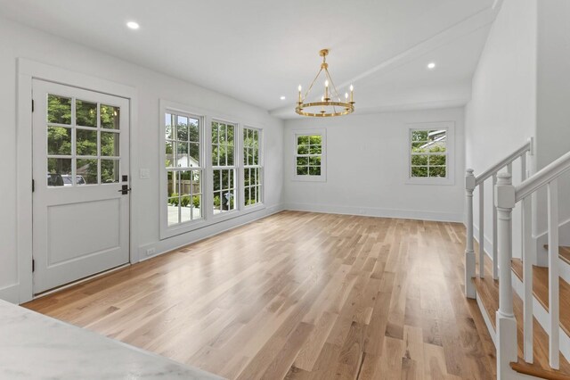 215 Lewisburg Ave, Franklin, TN 37064 - unfurnished dining area with a chandelier, light wood-type flooring, stairway, healthy amount of natural light, and recessed lighting