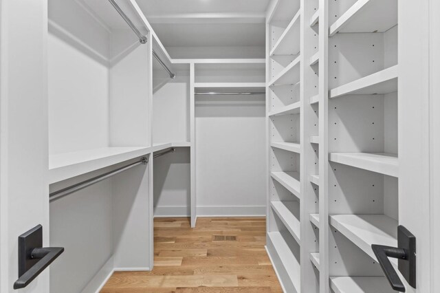 215 Lewisburg Ave, Franklin, TN 37064 - spacious closet with light wood-style flooring