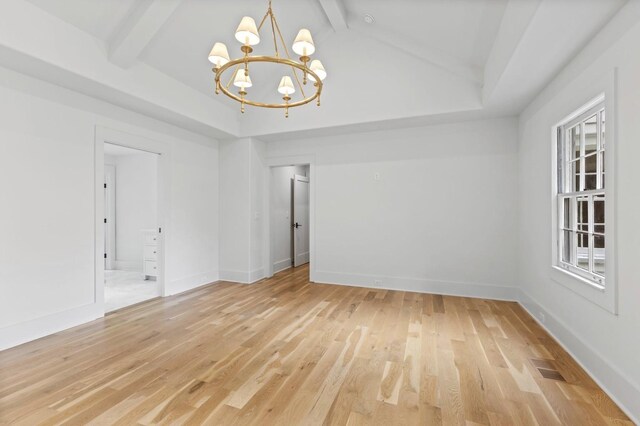 215 Lewisburg Ave, Franklin, TN 37064 - empty room with a chandelier, light wood-style flooring, and baseboards