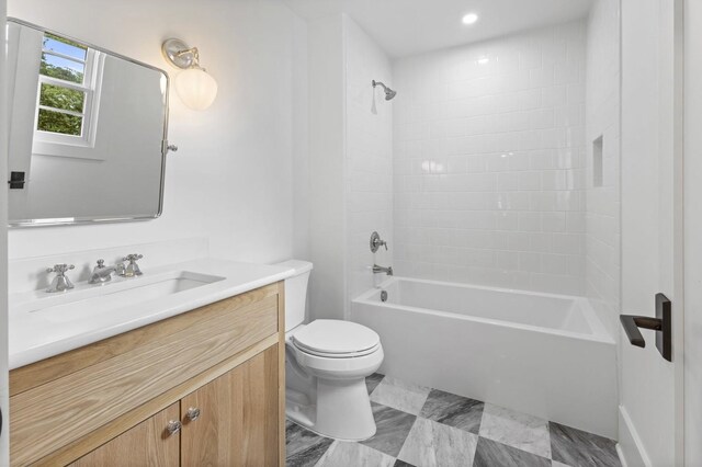 215 Lewisburg Ave, Franklin, TN 37064 - bathroom featuring toilet, vanity, and tub / shower combination