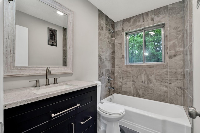 full bath with shower / washtub combination, toilet, and vanity