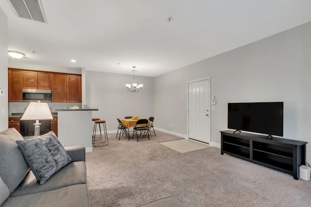 7230 Althorp Way Unit W 12, Nashville, TN 37211 - living area with light colored carpet, a chandelier, baseboards, and recessed lighting