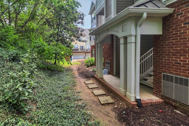 7230 Althorp Way Unit W 12, Nashville, TN 37211 - view of home's exterior featuring brick siding and entry steps