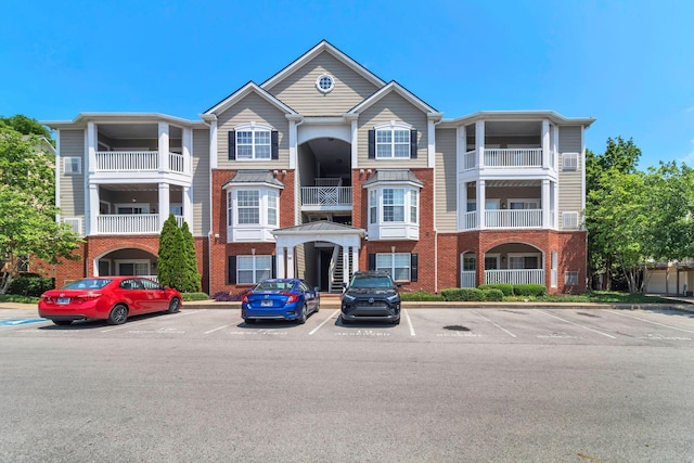 7230 Althorp Way Unit W 12, Nashville, TN 37211 - view of building exterior with uncovered parking