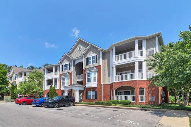 7230 Althorp Way Unit W 12, Nashville, TN 37211 - view of building exterior featuring uncovered parking