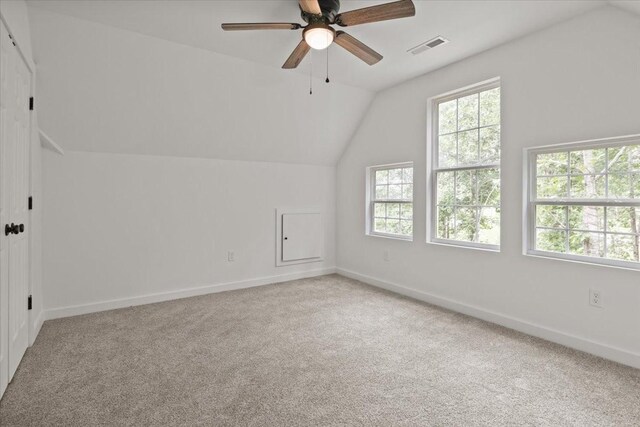 1014 Promise Land Rd, Charlotte, TN 37036 - additional living space with carpet floors, vaulted ceiling, and a ceiling fan
