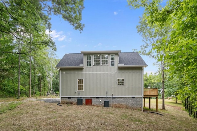 1014 Promise Land Rd, Charlotte, TN 37036 - back of property with crawl space, roof with shingles, and a deck
