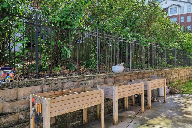 205 31st Ave N Unit 111, Nashville, TN 37203 - view of patio featuring fence