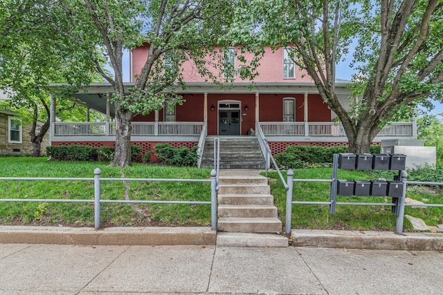 view of front facade with a porch and stairs