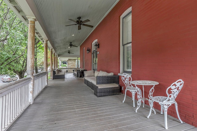wooden terrace with ceiling fan