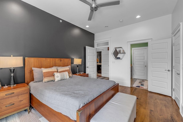 bedroom featuring recessed lighting, wood finished floors, baseboards, and a ceiling fan