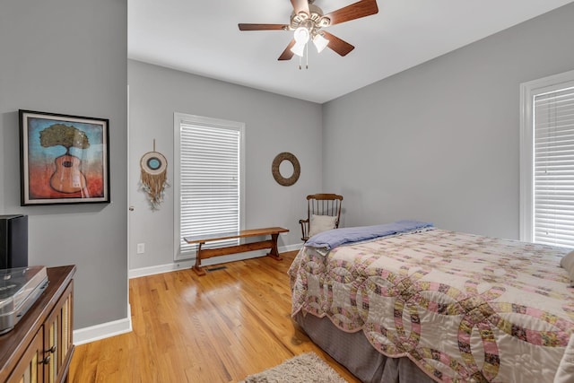 212 Spirit Hill Cir, Smyrna, TN 37167 - bedroom with light wood-style floors, baseboards, and a ceiling fan