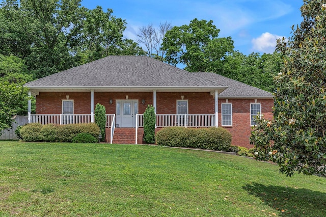 212 Spirit Hill Cir, Smyrna, TN 37167 - view of front of house featuring a front yard, a porch, and brick siding