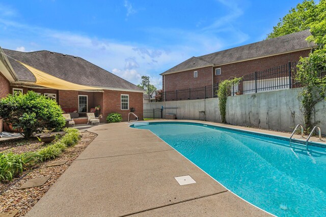 212 Spirit Hill Cir, Smyrna, TN 37167 - view of pool featuring a patio and a fenced backyard