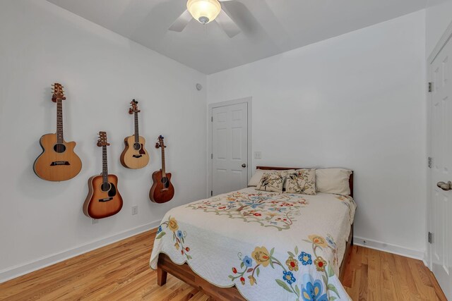 212 Spirit Hill Cir, Smyrna, TN 37167 - bedroom with wood finished floors, baseboards, and ceiling fan