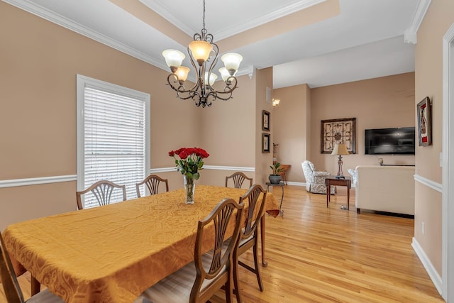212 Spirit Hill Cir, Smyrna, TN 37167 - dining room featuring a chandelier, light wood finished floors, ornamental molding, and baseboards