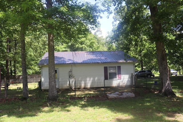 261 Oak Dr, Beechgrove, TN 37018 - view of home's exterior featuring metal roof