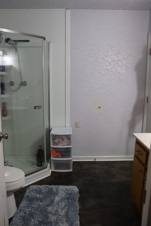 261 Oak Dr, Beechgrove, TN 37018 - full bathroom featuring a shower stall, baseboards, toilet, and vanity