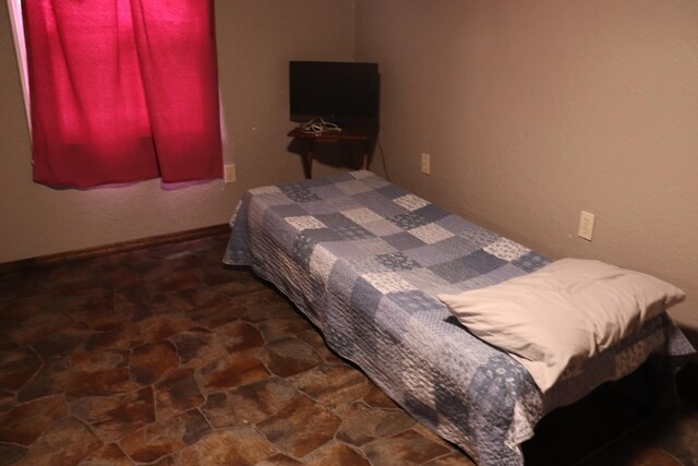 261 Oak Dr, Beechgrove, TN 37018 - bedroom featuring stone finish floors