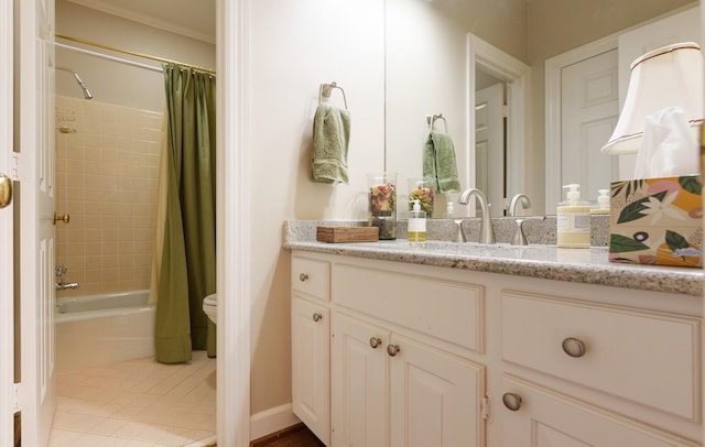 full bathroom featuring shower / tub combo with curtain, vanity, toilet, tile patterned floors, and ornamental molding