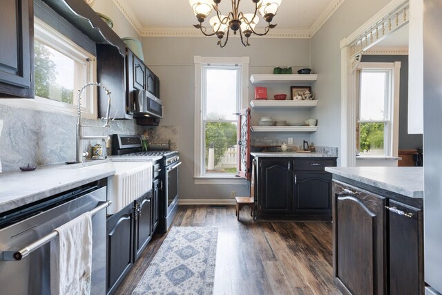 3310 Booker Ridge Rd, Mount Pleasant, TN 38474 - kitchen with appliances with stainless steel finishes, dark wood-style flooring, light countertops, a chandelier, and open shelves