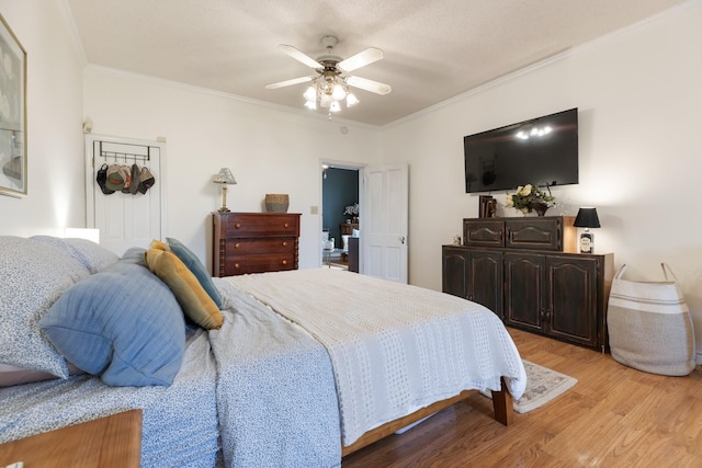 3310 Booker Ridge Rd, Mount Pleasant, TN 38474 - bedroom with light wood-style floors, crown molding, and ceiling fan