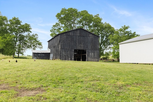 3310 Booker Ridge Rd, Mount Pleasant, TN 38474 - view of barn featuring a yard
