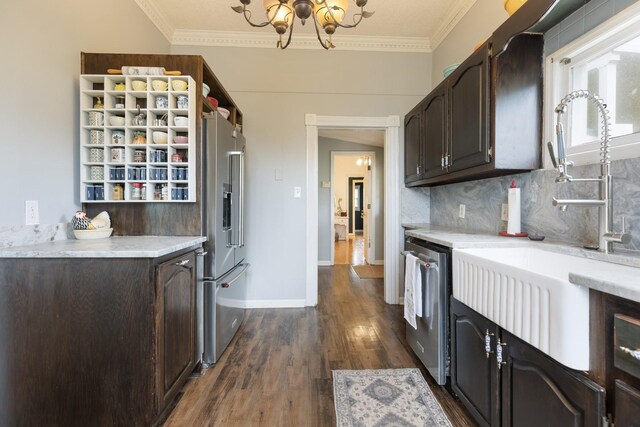 3310 Booker Ridge Rd, Mount Pleasant, TN 38474 - kitchen featuring stainless steel appliances, dark wood-type flooring, dark brown cabinets, a sink, and ornamental molding