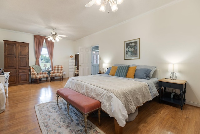 3310 Booker Ridge Rd, Mount Pleasant, TN 38474 - bedroom with ornamental molding, light wood-style flooring, and a ceiling fan