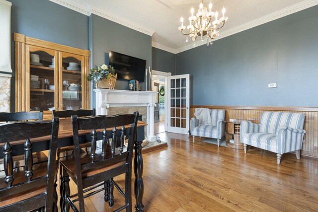 3310 Booker Ridge Rd, Mount Pleasant, TN 38474 - dining space with a chandelier, crown molding, wood finished floors, and a high end fireplace