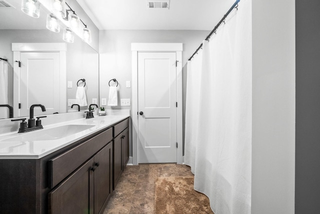 full bathroom with double vanity
