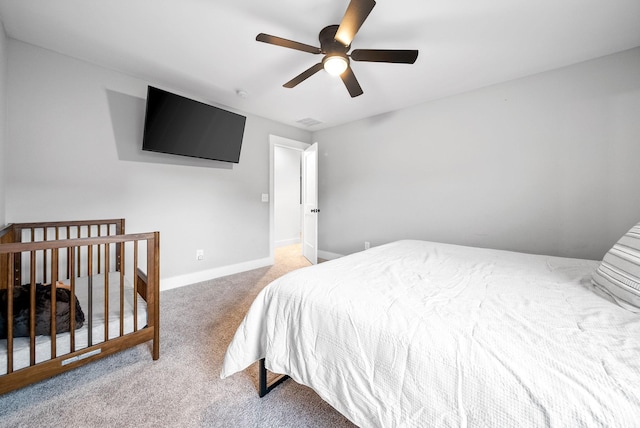 bedroom featuring carpet, ceiling fan, and baseboards