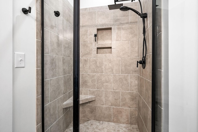 bathroom featuring a stall shower