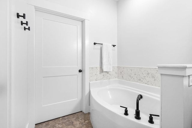full bathroom featuring a garden tub