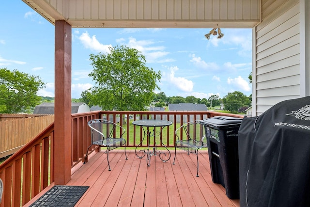 wooden terrace with grilling area