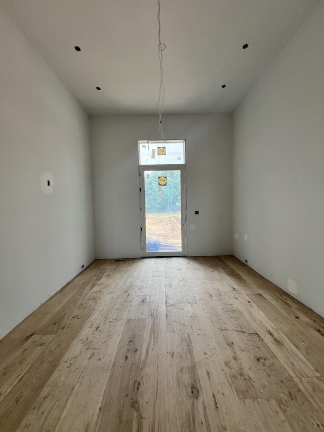 7007 Belcastle Ln, College Grove, TN 37046 - unfurnished dining area with hardwood / wood-style floors