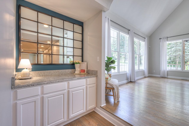 114 Moonlight Dr, Gallatin, TN 37066 - sitting room with light wood-style flooring, vaulted ceiling, and baseboards