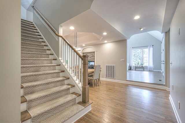 114 Moonlight Dr, Gallatin, TN 37066 - stairway with wood finished floors, baseboards, recessed lighting, and vaulted ceiling