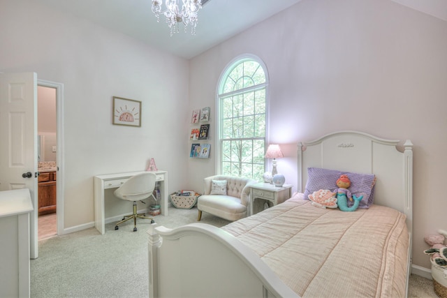 114 Moonlight Dr, Gallatin, TN 37066 - carpeted bedroom with a chandelier, baseboards, and ensuite bathroom