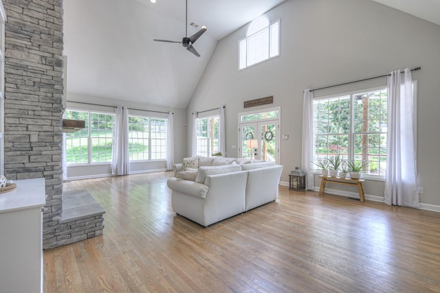 114 Moonlight Dr, Gallatin, TN 37066 - living area featuring high vaulted ceiling, a ceiling fan, wood finished floors, and baseboards