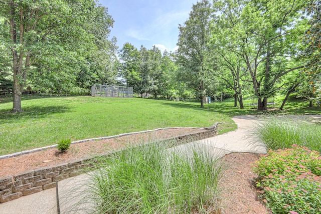 114 Moonlight Dr, Gallatin, TN 37066 - view of grassy yard with an exterior structure and an outbuilding
