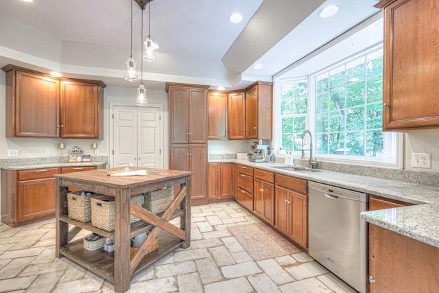 114 Moonlight Dr, Gallatin, TN 37066 - kitchen with stainless steel dishwasher, a sink, a tray ceiling, recessed lighting, and hanging light fixtures