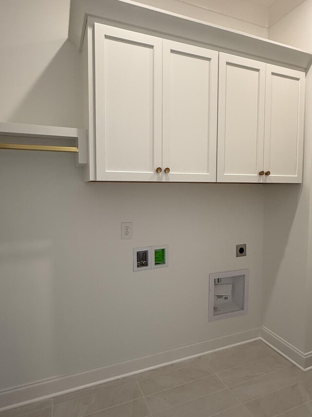 3150 Long Branch Cir, Franklin, TN 37064 - washroom featuring electric dryer hookup, baseboards, cabinet space, and washer hookup