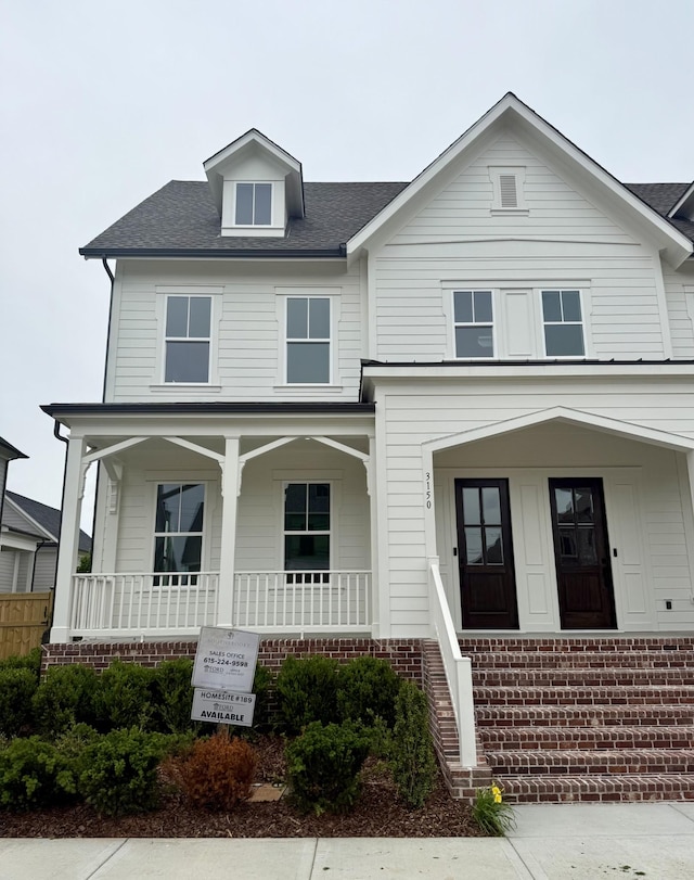 3150 Long Branch Cir, Franklin, TN 37064 - view of front of house featuring covered porch and a shingled roof