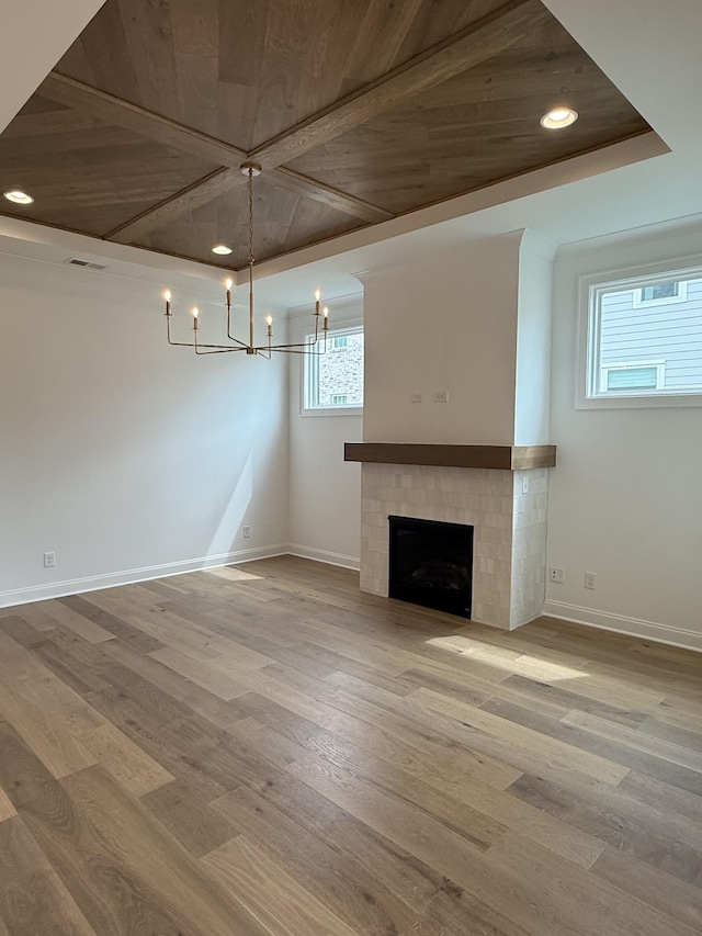3150 Long Branch Cir, Franklin, TN 37064 - unfurnished living room with baseboards, wood finished floors, recessed lighting, a chandelier, and a tiled fireplace
