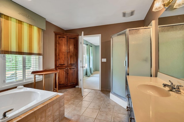 1760 Camp Branch Rd, Mount Pleasant, TN 38474 - full bathroom with plenty of natural light, a stall shower, a bath, and tile patterned flooring